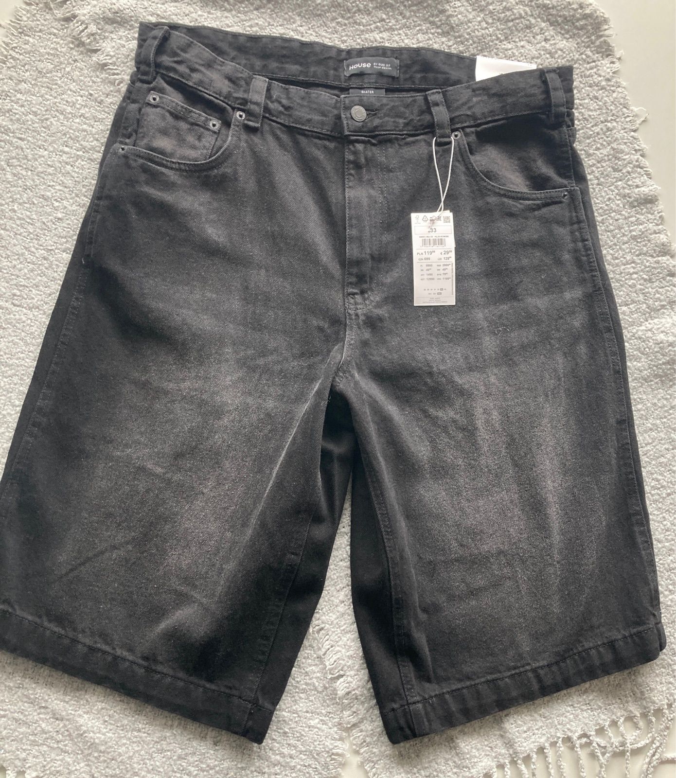Black denim shorts