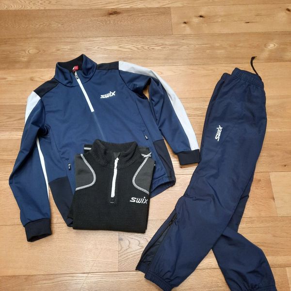 Tuta top microfibra asics