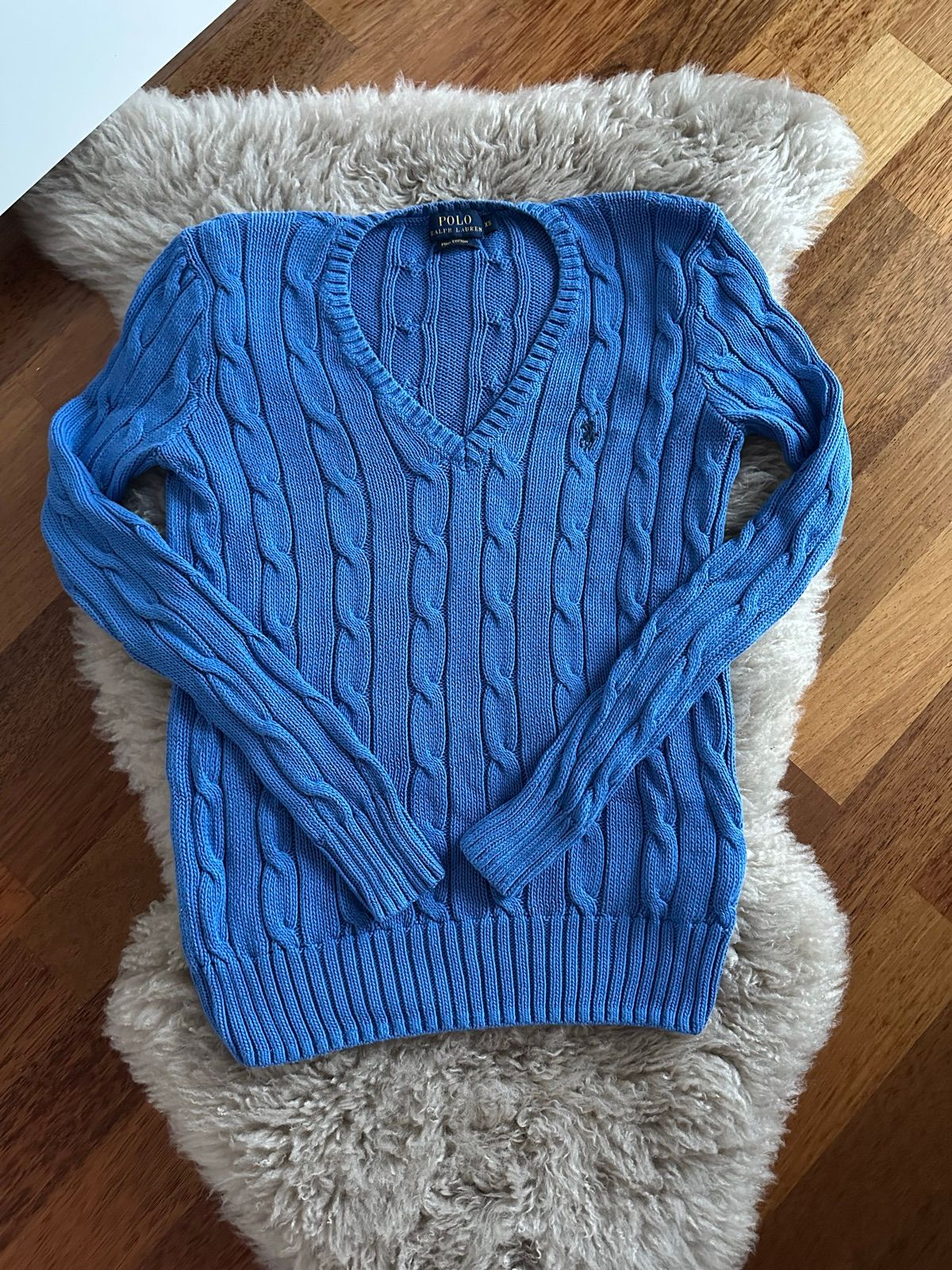 Blue cable knit sweater