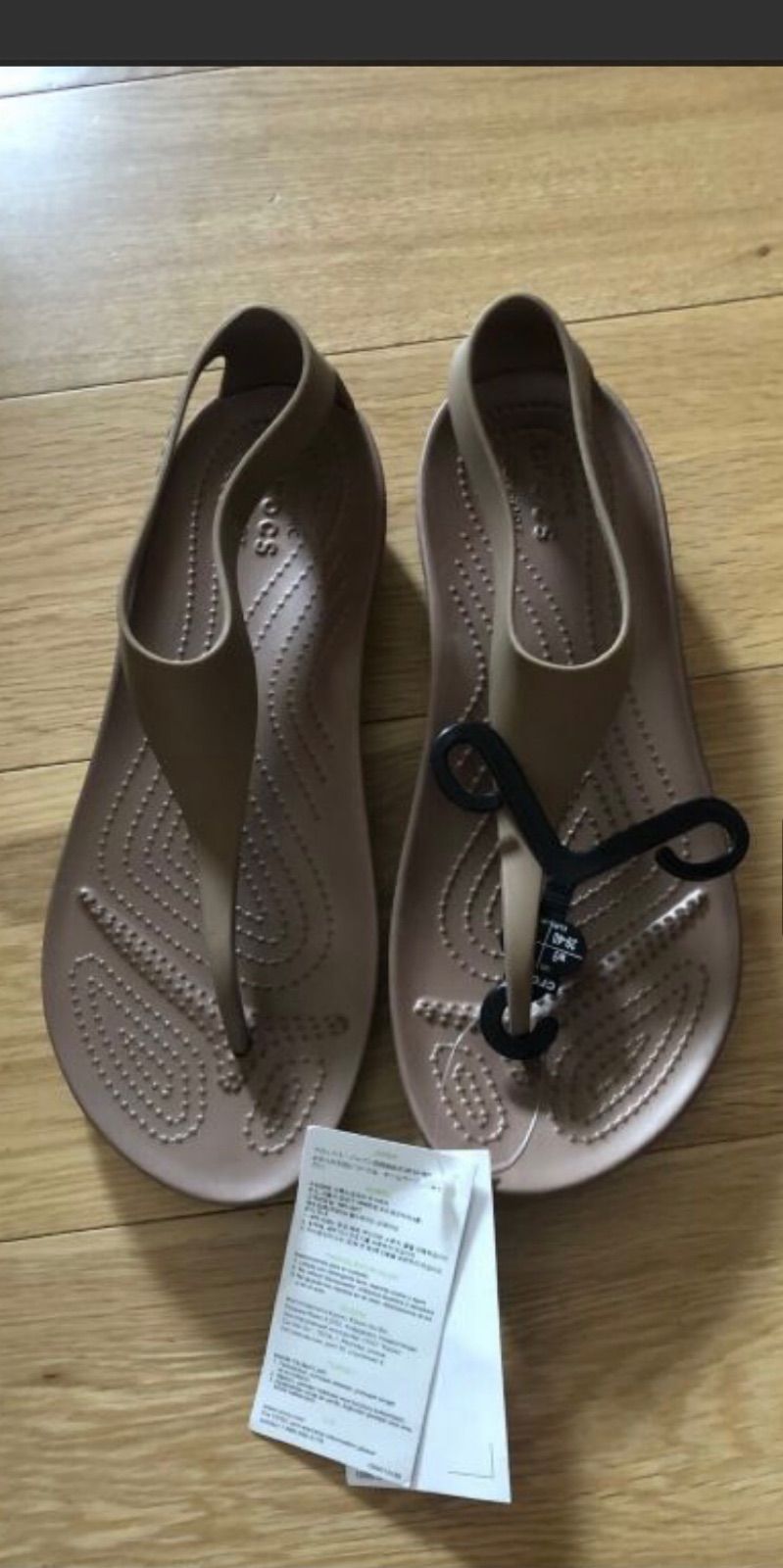 Crocs serena flip bronze best sale